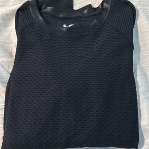 Long Sleeve Black Koral top! Shiny black band around bottom of shirt and cuffs!